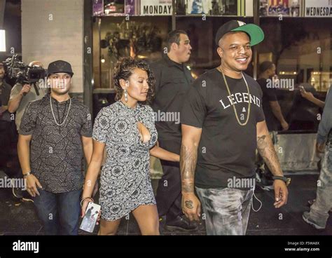 Curtis Young, son of Dr. Dre, and his wife Vanessa leaving after performing live at Cosmo in ...