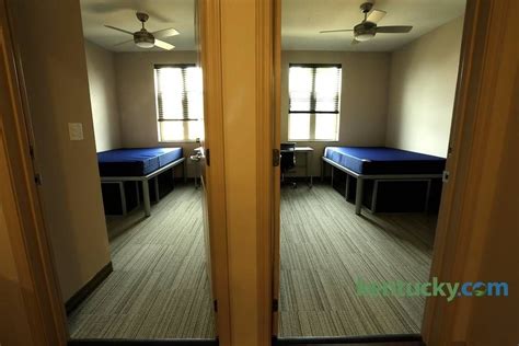 A typical dorm room with individual bedrooms for each student at Woodland Glen I, a new dorm on ...