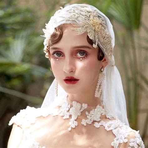 Juliet cap veil embroideried with sequins at two sides. This is a ...