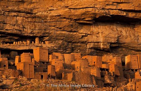 Abandoned cliff dwellings on the Bandiagara escarpment above Telí village, Dogon Country, Mali ...