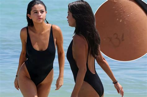 Selena Gomez debuts new thigh tattoo and showcases smoking hot body in ...