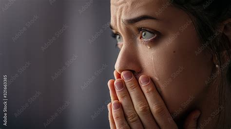 Sad unhappy grieving crying woman with tears eyes closeup Stock Photo | Adobe Stock