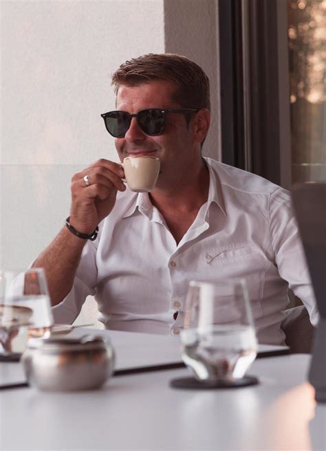 Man drinking coffee 12689975 Stock Photo at Vecteezy