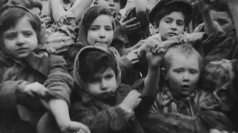 Children photographed together in Auschwitz meet 72 years later