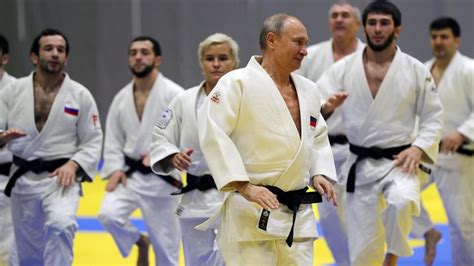 Putin demonstrates black belt judo skills