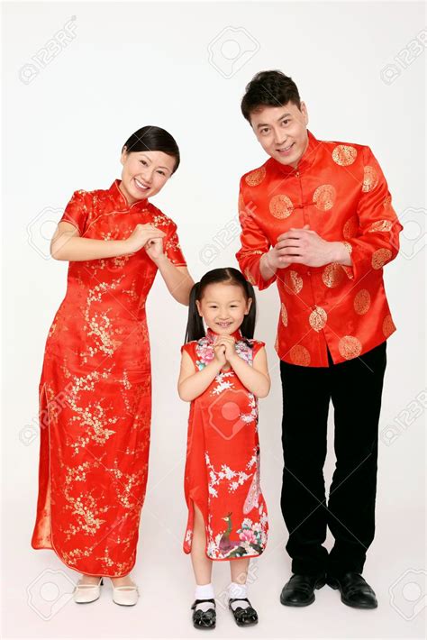 Family in chinese traditional clothing wishing Happy Chinese New Year Stock Photo - 39 ...