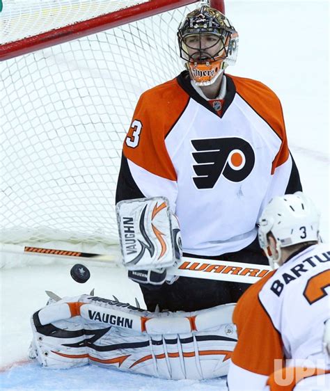 Photo: Philadelphia Flyers Brian Boucher reacts at Prudential Center in New Jersey ...