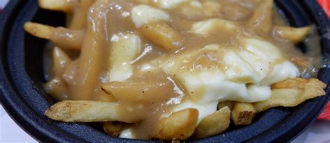 Chips, Cheese, And Gravy | Traditional Street Food From Isle of Man, United Kingdom | TasteAtlas