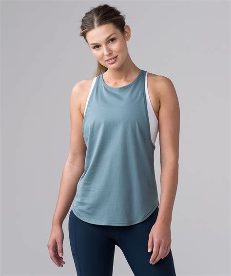 $38 We designed this muscle tank with super low armholes for airflow ...