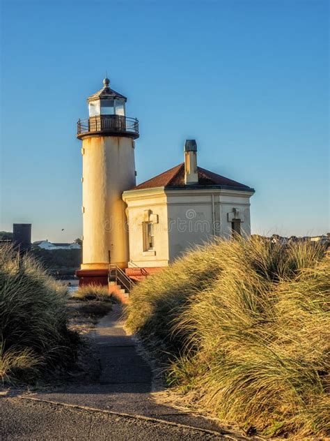 Lighthouse at beach stock photo. Image of grassy, abandoned - 45438510