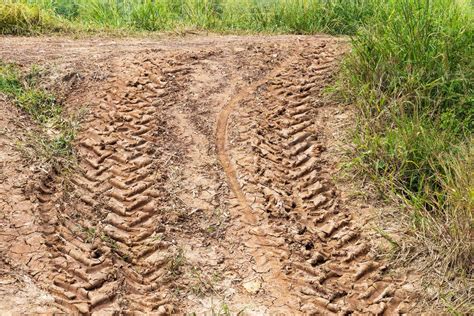 Tire tracks in dirt mud. 7520218 Stock Photo at Vecteezy