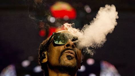 Snoop Dogg isn't quitting weed, here's what he really meant by ‘giving ...