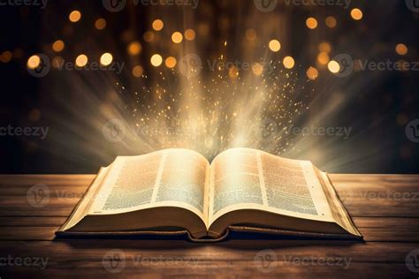 Open holy bible book with glowing lights in church 26781324 Stock Photo ...