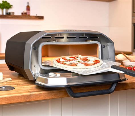 The Ooni Volt 12 Electric Pizza Oven Cooks Pizzas Indoors or Out in 90 Seconds