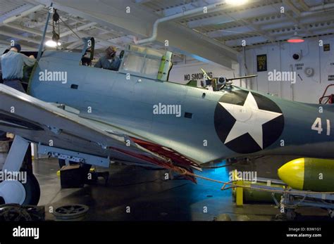 A Douglas SBD-3 Dauntless dive bomber on static "repair deck" display Stock Photo, Royalty Free ...