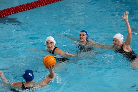 Premium Photo | Water polo players at the pool with swimming equipment