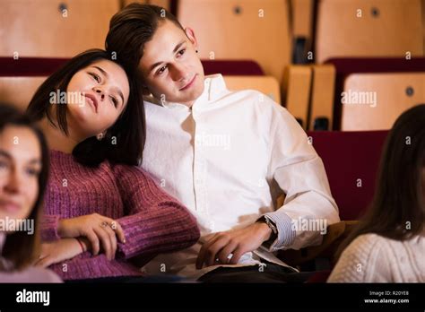 Couple watching movie at date in cinema house Stock Photo - Alamy