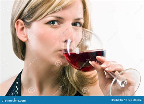 Young woman drinking wine stock image. Image of cheers - 33704937