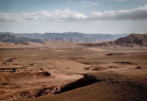 Free Photo | Wide angle shot of large areas of arid land and mountains