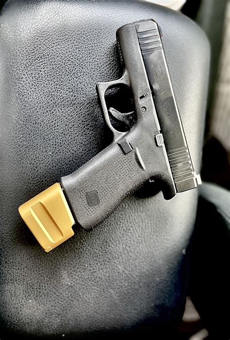 In Glock I Trust 43x S15 mag with +5 Gold extension baseplate : r/GunPorn