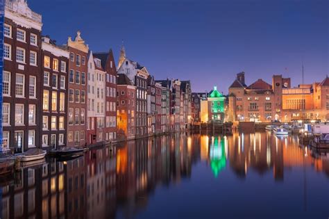 Premium Photo | Amsterdam netherlands in damrak at night