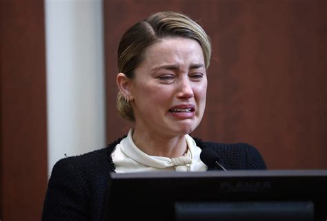 Amber Heard bursts into tears as she recalls alleged violation by Johnny Depp | The Independent