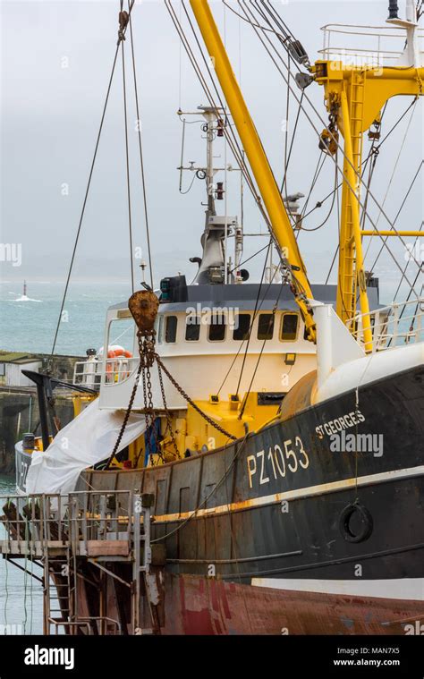 A deep sea trawler from the Stevenson fleet of fishing vessels and ships at Newlyn on the west ...