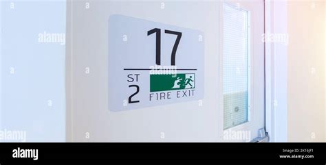 Fire Exit door sign for emergency. Stairwell fire for escape in ...