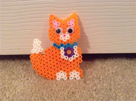 Orange kitty cat | Easy perler beads ideas, Melty bead patterns, Perler beads