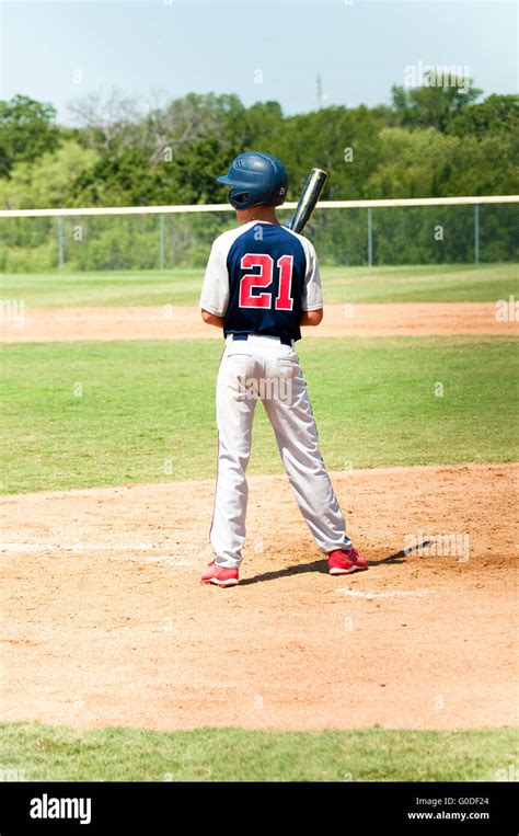 Teen baseball player at bat Stock Photo - Alamy