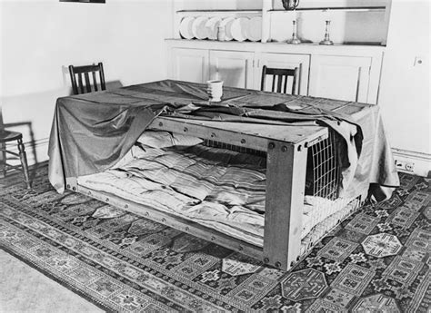 A Couple Sleeping in a Morrison Shelter Used as Protection From ...