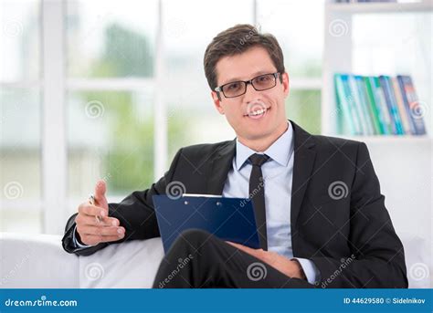 Portrait Of Male Psychologist In Office Stock Photo - Image: 44629580