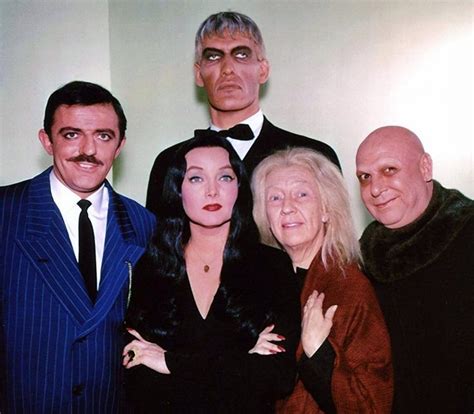 Meet the Addams Family, plus see the classic TV show's opening credits ...