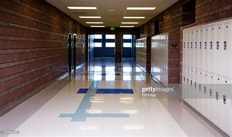 An empty school hallway lined with lockers – Artofit