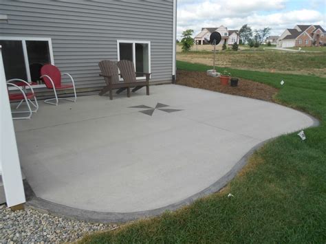 Plain concrete with edge | Concrete backyard, Concrete patio designs, Poured concrete patio