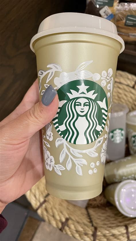 Starbucks is Selling A Color Changing Christmas Cup That Changes from Gold to Silver