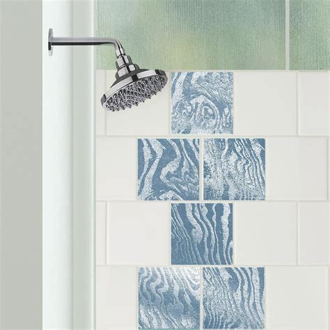 Artfully designed, affordable tile decals provide a makeover in minutes. Recommended for use on ...