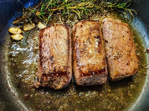 Rosemary lamb steaks with garlic 3008126 Stock Photo at Vecteezy