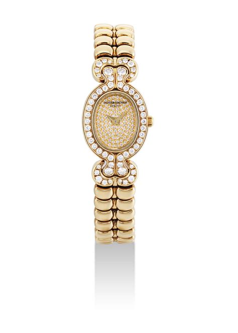 VACHERON CONSTANTIN. A LADY'S 18K GOLD AND DIAMOND-SET OVAL BRACELET WATCH