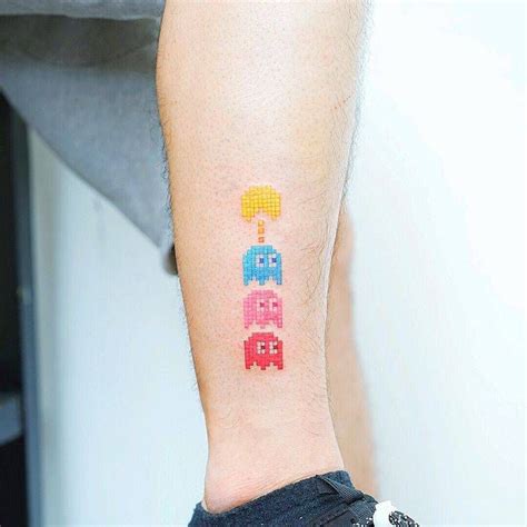 Classic Pac-Man tattoo on the leg. | Pacman tattoo, Tattoos for guys ...