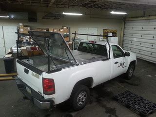 Ladder Rack & Hard Truck Bed Cover on Silverado Pickup Tru… | Flickr