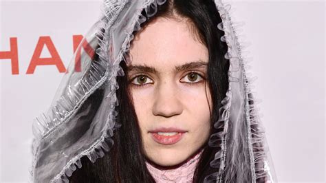 Why Grimes' New Tattoos Are Causing Such A Stir