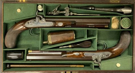 Cased pair of Joseph Manton Percussion Duelling Pistols | Powder Flask UK