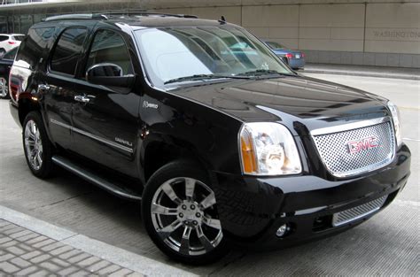 GMC Yukon Denali...yes please. Awesome car and its a hybrid ...