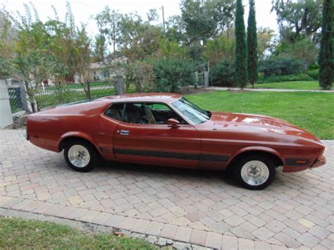 Seller of Classic Cars - 1973 Ford Mustang (Burnt orange/Tan)