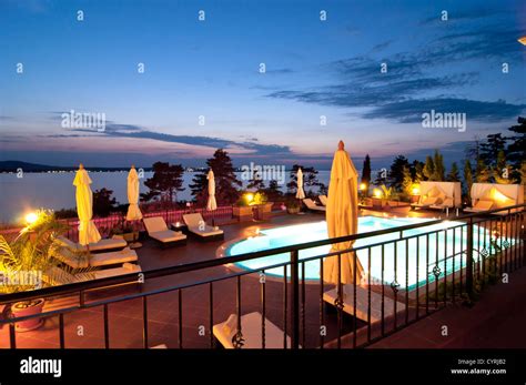 Swimming pool of luxury hotel at night Stock Photo - Alamy