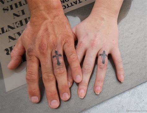 49 Creative Cross Tattoos On Fingers