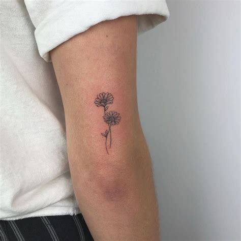 107 Best Daisy Tattoos | Daisy tattoo, Dainty tattoos, Daisy tattoo designs