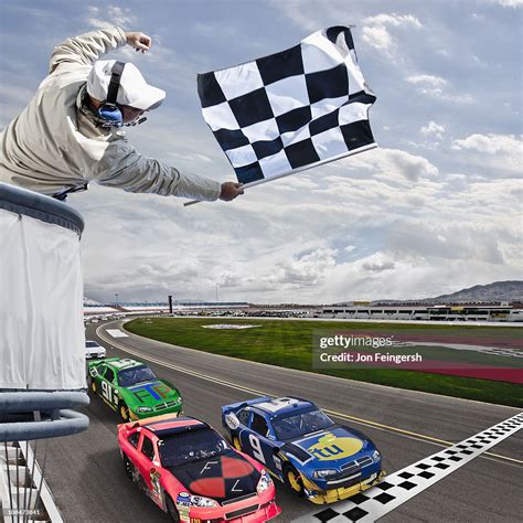 Race Car Crossing The Finish Line High-Res Stock Photo - Getty Images