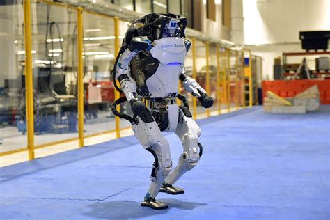 Behind those dancing robots, scientists had to bust a move | AP News